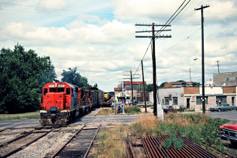 Eastbound Grand Trunk Western Railroad freight train in Holly, Michigan, on July 30, 1978. Photograph by John F. Bjorklund, © 2016, Center for Railroad Photography and Art. Bjorklund-58-22-25