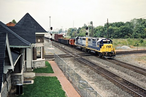 Eastbound CSX Transportation freight train passing station in Marion, Ohio, on October 4, 2002. Photograph by John F. Bjorklund, © 2015, Center for Railroad Photography and Art. Bjorklund-46-27-08