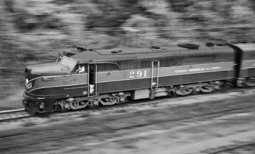 PA locomotive no. 291 rushes northbound Gulf, Mobile and Ohio Railroad <i>Gulf Coast Rebel</i> toward Meridian, Mississippi, near dusk on a warm afternoon in August 1956. Photograph by J. Parker Lamb, © 2016, Center for Railroad Photography and Art. Lamb-01-132-05