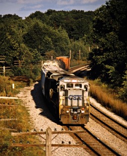 Westbound CSX Transportation freight train in Albion, Indiana, on September 9, 1995. Photograph by John F. Bjorklund, © 2015, Center for Railroad Photography and Art. Bjorklund-45-10-09