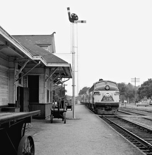 Mobile-bound Louisville and Nashville Railroad <i>Azalean</i> passenger train passes classic station at Ocean Springs, Mississippi, in August 1955. Photograph by J. Parker Lamb, © 2016, Center for Railroad Photography and Art. Lamb-01-137-04
