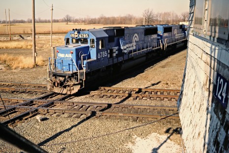 Southbound Conrail freight train crossing an east-west Conrail line in Ridgeway, Ohio, on November 14, 1987. Photograph by John F. Bjorklund, © 2015, Center for Railroad Photography and Art. Bjorklund-30-18-14