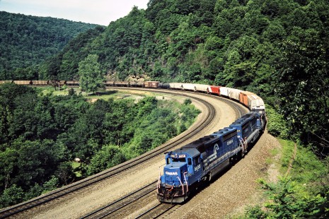 Westbound Conrail freight train rounding Horseshoe Curve near Altoona, Pennsylvania, on June 22, 1986. Photograph by John F. Bjorklund, © 2015, Center for Railroad Photography and Art. Bjorklund-30-04-18