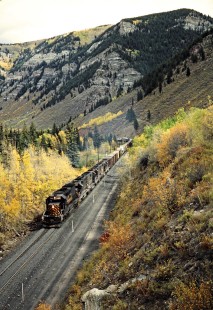 Eastbound Denver and Rio Grande Western Railroad freight train climbing Tennessee Pass near Gilman, Colorado, on September 22, 1986. Photograph by John F. Bjorklund, © 2015, Center for Railroad Photography and Art. Bjorklund-49-01-04
