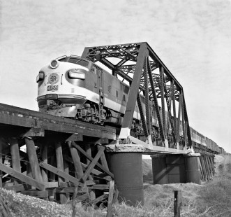 Northbound Southern Railway freight train rumbles through a short truss bridge a few miles south of the yard at Meridian, Mississippi, in January 1955. Silver paint on bridge members was a result of rusting from flood. Photograph by J. Parker Lamb, © 2016, Center for Railroad Photography and Art. Lamb-01-109-01