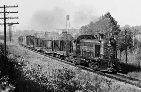 Northbound Gulf, Mobile and Ohio Railroad RS2 locomotive leads an extra local freight train out of Meridian, Mississippi, for Okolona in early morning of May 1951. Photograph by J. Parker Lamb, © 2016, Center for Railroad Photography and Art. Lamb-01-126-02