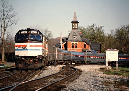 Westbound Amtrak <i>Capitol Limited</i> passenger train on CSX Transportation track at station in Point of Rocks, Maryland, on April 5, 1990. Photograph by John F. Bjorklund, © 2015, Center for Railroad Photography and Art. Bjorklund-44-10-09