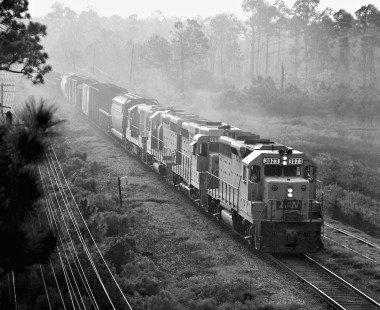 New Orleans-bound Louisville and Nashville Railroad freight train plows through early morning fog near Bay St. Louis, Mississippi, in August 1966. Photograph by J. Parker Lamb, © 2016, Center for Railroad Photography and Art. Lamb-01-140-08