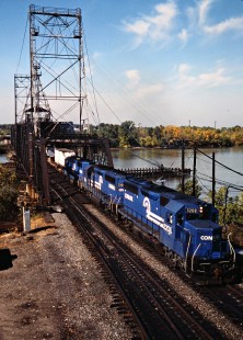 Eastbound Conrail freight train crossing Maumee River in Toledo, Ohio, on October 15, 1983. Photograph by John F. Bjorklund, © 2015, Center for Railroad Photography and Art. Bjorklund-29-07-06