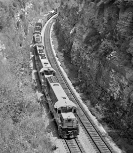 Louisville and Nashville Railroad Birmingham-bound freight train traverses deep cut south of Radnor Yard in Nashville, Tennessee, in August 1963. Photograph by J. Parker Lamb, © 2016, Center for Railroad Photography and Art. Lamb-01-142-03