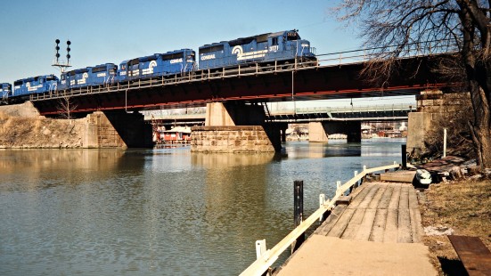 Eastbound Conrail freight train crossing the Huron River at Huron, Ohio, on March 22, 1987. Photograph by John F. Bjorklund, © 2015, Center for Railroad Photography and Art. Bjorklund-30-12-06