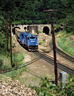 Westbound Conrail freight train at tunnel in Gallitzin, Pennsylvania, on June 21, 1986. Photograph by John F. Bjorklund, © 2015, Center for Railroad Photography and Art. Bjorklund-29-28-01