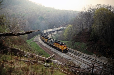 Westbound CSX Transportation freight train rounding curve near Manilla, Pennsylvania, on May 15, 1988. Photograph by John F. Bjorklund, © 2015, Center for Railroad Photography and Art. Bjorklund-44-05-18