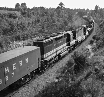 Mid-train view of southbound Southern Railway freight no. 153 shows radio-controlled pusher locomotives (SD24 and SD40) in September 1966. Eventually this type of radio signal proved to be ineffective in highly mountainous territory. Photograph by J. Parker Lamb, © 2016, Center for Railroad Photography and Art. Lamb-01-110-11