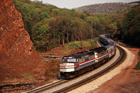Eastbound Amtrak <i>Capitol Limited</i> passenger train on CSX Transportation track near Fairhope, Pennsylvania, on May 14, 1988. Photograph by John F. Bjorklund, © 2015, Center for Railroad Photography and Art. Bjorklund-44-02-15