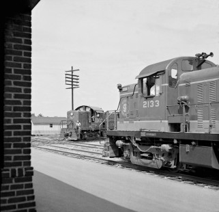 Early Alco units of Gulf, Mobile and Ohio Railroad and Southern Railway cross paths at the station in Corinth, Mississippi, in August 1955. Photograph by J. Parker Lamb, © 2016, Center for Railroad Photography and Art. Lamb-01-131-06