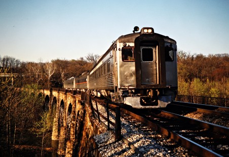 Eastbound Maryland Area Regional Commuter Budd RDCs (rail diesel cars) crossing CSX Transportation's Thomas Viaduct in Relay, Maryland, on April 5, 1990. Photograph by John F. Bjorklund, © 2015, Center for Railroad Photography and Art. Bjorklund-44-09-12