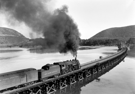 Eastbound New York Central steam locomotive no. 4705 on the trestle over Doodletown Bight, part of the Hudson River near Doodletown, New York in 1948. Iona Island is visible at the end of the bridge. Photograph by Donald W. Furler. Furler-18-065-01; © 2017, Center for Railroad Photography and Art
