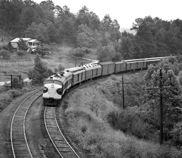 Westbound Southern Railway passenger train no. 7, the <i>Kansas City-Florida Special</i>, climbs grade toward Weems crossovers (near Norris Yard in Birmingham, Alabama) in September 1962. Train will continue to Memphis & Kansas City on Frisco lines. Photograph by J. Parker Lamb, © 2016, Center for Railroad Photography and Art. Lamb-01-116-02