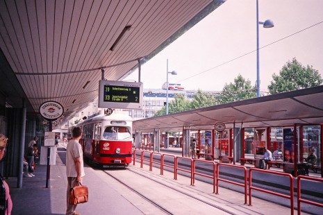 A man and other passengers wait for tram no. 31-4802 to arrive in Vienna, Capital of Austria, Austria, on May 21, 2001. Photograph by Fred M. Springer, © 2014, Center for Railroad Photography and Art. Springer-Austria-16-10