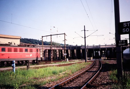 Austrian Federal Railways (ÖBB) electric locomotive no. 1041-024-9 enters the railroad roundhouse in Attnang Puchheim, Upper Austria, Austria, on May 24, 2001. Photograph by Fred M. Springer, © 2014, Center for Railroad Photography and Art. Springer-Austria-20-28