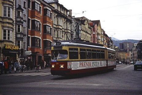 Innsbruck tram "Line 3" electric streetcar no. 3-34 heads to Amras as it moves through the crowded streets of Innsbruck, Tyrol, Austria, on March 18, 1992. Photograph by Fred M. Springer, © 2014, Center for Railroad Photography and Art. Springer-ZimZam(2)-Swiss-15-16