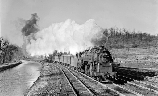 Reading Company 4-6-2 steam locomotive no. 210 pulling an eastbound passenger train along the Lehigh Coal & Navigation Company canal at Bethlehem, Pennsylvania, circa 1950. Photograph by Donald W. Furler, © 2017, Center for Railroad Photography and Art, Furler-19-007-01