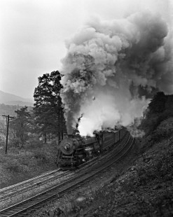 Western Maryland Railway steam locomotive no. 1124 approaches Cash Valley Road in Corrigansville, Maryland with a westbound freight train on October 11, 1952. Furler-22-092-01;   © 2017, Center for Railroad Photography and Art