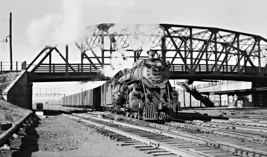 Reading Company 4-6-2 steam locomotive no. 110 pulling eastbound Baltimore & Ohio train no. 118 under Communipaw Avenue in Jersey City, New Jersey, on October 18, 1939. Photograph by Donald W. Furler, © 2017, Center for Railroad Photography and Art, Furler-08-038-02