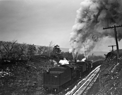 Reading Company 2-8-0 steam locomotives nos. 1902 and 1695 pushing an eastbound freight train led by no. 1717 east of Mainville, Pennsylvania, on November 17, 1940. This was the third of three eastbound trains that ran in close succession every Sunday afternoon on the Catawissa Branch. Photograph by Donald W. Furler,  © 2017, Center for Railroad Photography and Art, Furler-03-111-02