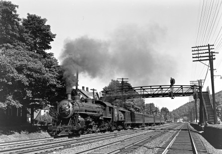 Erie Railroad 4-6-2 steam locomotive no. 2541 leading an eastbound passenger train through Suffern, New York, on June 22, 1949. Photograph by Donald W. Furler, © 2017, Center for Railroad Photography and Art, Furler-19-104-02