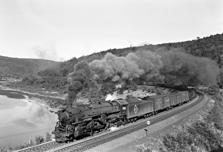 Erie Railroad 2-8-4 steam locomotive no. 3369 pulling a westbound freight train along the Delaware River at Shohola, Pennsylvania, across from Pond Eddy, New York, on September 23, 1947. Photograph by Donald W. Furler, © 2017, Center for Railroad Photography and Art, Furler-21-010-02