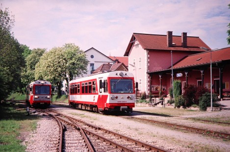 Waldviertler Narrow-Gauge Railway Club diesel passenger trains nos. 5090-004-7 and 5090-005-9 alongside each other in Weitra, Lower Austria, Austria, on May 15, 2001. Photograph by Fred M. Springer, © 2014, Center for Railroad Photography and Art. Springer-Austria-08-25