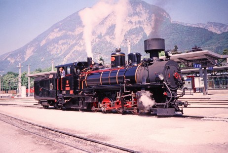 An Zillertal Railway steam locomotive stands before a mountain in Jenbach, Tyrol, Austria, on May 23, 2001. Photograph by Fred M. Springer, © 2014, Center for Railroad Photography and Art. Springer-Austria-18-09