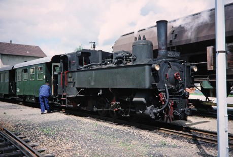 Waldviertler Narrow-Gauge Railway Club steam locomotive no. 298.207 attended by a worker in Gross Gerungs, Lower Austria, Austria, on May 31, 1993. Photograph by Fred M. Springer, © 2014, Center for Railroad Photography and Art. Springer-Austria-17-19