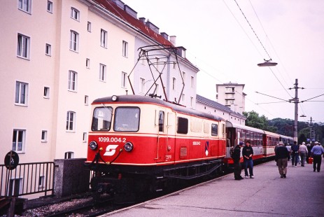 Mariazell Railway electric locomotive no. 1099.004-2 waits for passengers to board the train in St. Polten, Lower Austria, Austria, on May 15, 2001. Photograph by Fred M. Springer, © 2014, Center for Railroad Photography and Art. Springer-Austria-09-37