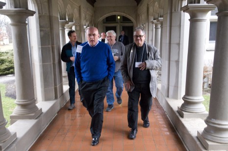 McNair Evans, David Lester, Lou Gerard, and David Daruska walk the breezeway between Reid Hall and Lily Reid Holt Memorial Chapel at Saturday presentations. Greg McDonnell and Otto Vondrak are visible in the background. Center for Railroad Photography and Art. Photograph by Henry A. Koshollek.