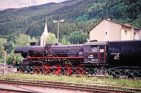 A portrait of Austrian Society for Railway History 2-10-0 steam locomotive no. 52.7046 in Selzthal, Upper Austria, Austria, on May 24, 2001. Photograph by Fred M. Springer, © 2014, Center for Railroad Photography and Art. Springer-Austria-21-03