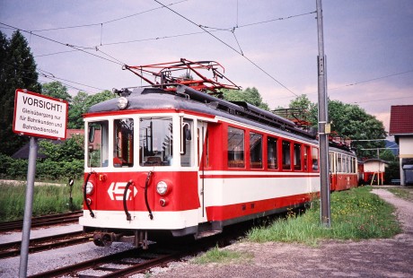 A Stern & Hafferl Verkehr red electric streetcar in Attersee, Salzburg, Austria, on May 25, 2001. Photograph by Fred M. Springer, © 2014, Center for Railroad Photography and Art. Springer-Austria-23-33