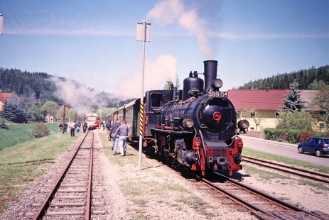 Passengers observe Waldviertler Narrow-Gauge Railway Club 0-8-4T steam locomotive no. 399.04 in Langschlag, Lower Austria, Austria, on May 13, 2001. Photograph by Fred M. Springer, © 2014, Center for Railroad Photography and Art. Springer-Austria-05-21