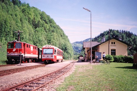Several photographers capture profile views of Austrian Federal Railways (ÖBB) diesel locomotive no. 2095-005-1 and Ybbs Valley Railway diesel passenger car no. 5090-011-7 at Opponitz station in Oppnitz, Lower Austria, Austria, on May 16, 2001. Photograph by Fred M. Springer, © 2014, Center for Railroad Photography and Art. Springer-Austria-09-03
