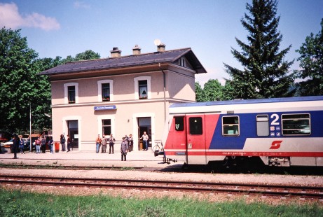 People wait on the platform of Allenmarkt-Thenneberg station as Austrian Federal Railways (ÖBB) diesel passenger car no. 5147-006-0 approaches in Altenmarkt, Lower Austria, Austria, on May 19, 2001. Photograph by Fred M. Springer, © 2014, Center for Railroad Photography and Art. Springer-Austria-13-17