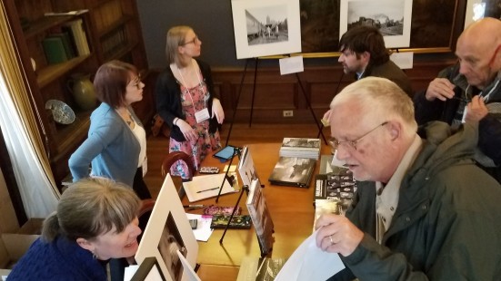 CRP&A staff members run the book sale table at Saturday night reception. Center for Railroad Photography & Art. Photograph by Otto Vondrak.