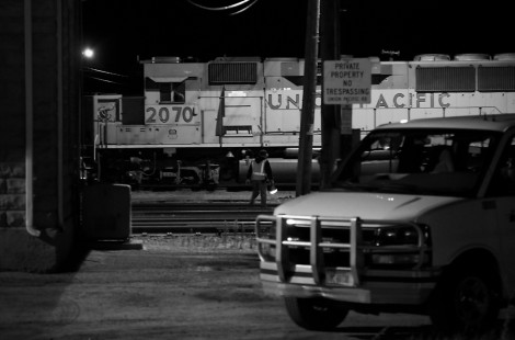 <strong>Travis Dewitz, Altoona, Wisconsin</strong>
Union Pacific crew checks their train as a Transport America crew van waits at the Altoona yard office.

<strong>Judge's Comment:</strong>
Night work. Love it!
